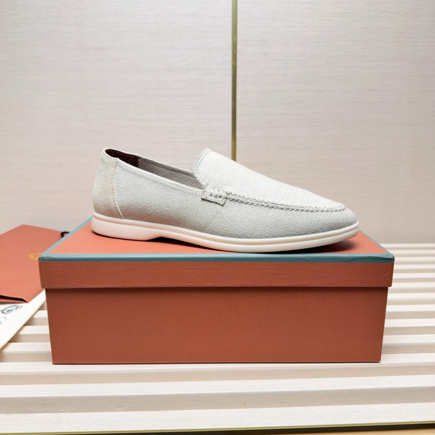 Men's Men's Shoes 💰400 Loro PIana moccasins are made of wish wool fabric. The upper is made of knitted fabric, made on a loom, and then attached to a rubber sole. The Rain System's water-repellent treatment enhances the shoe's functional design, while the suede details give the shoe a sense of elegance and sophistication. Made from Wish, fine wool from Australian and New Zealand Merino sheep